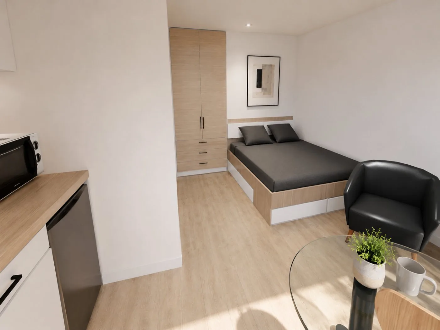 Chambre · lit, rangement et coin repas